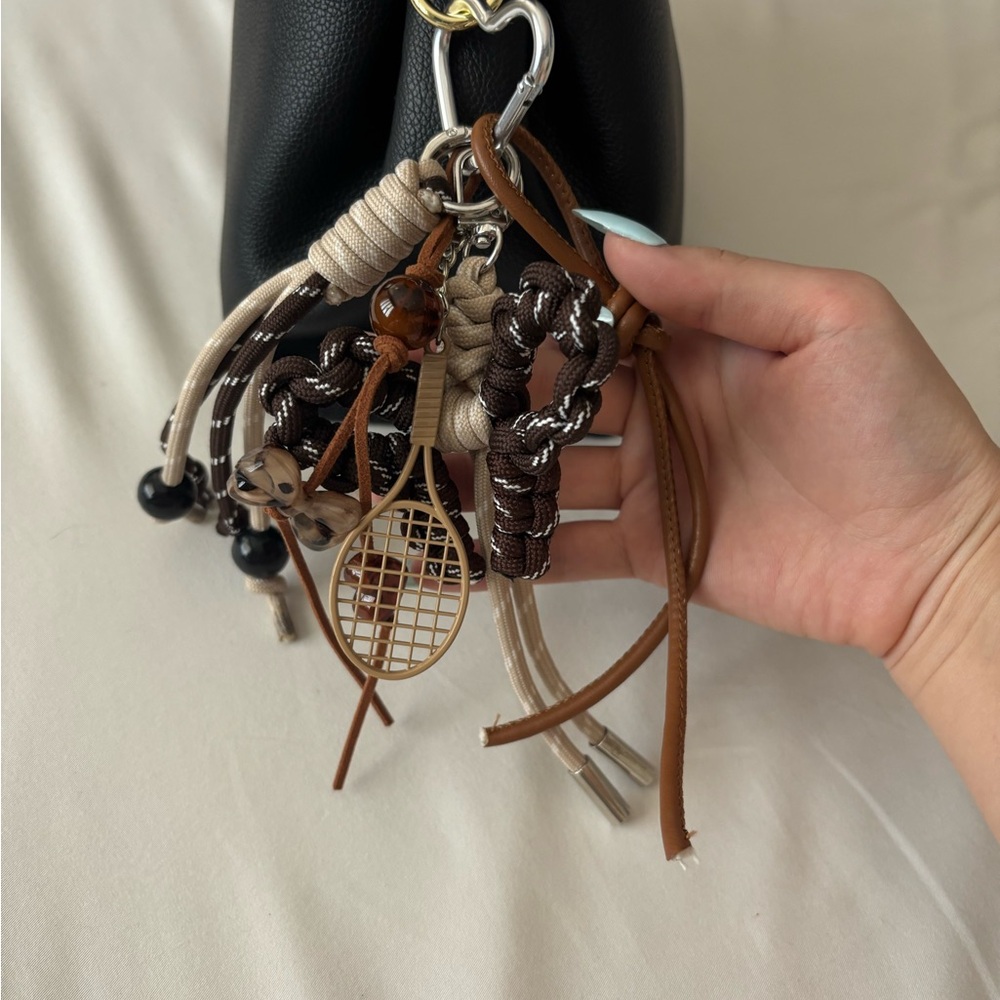 Songmont Black and Brown Accessory Charm